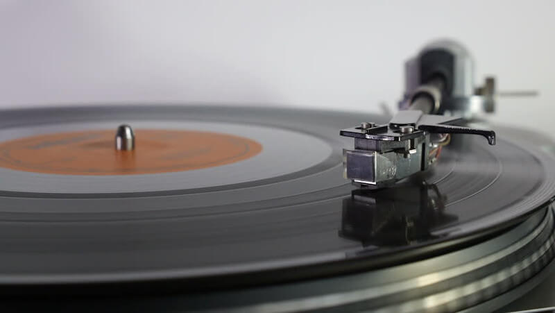 Close up view of a turntable and stylus playing a record