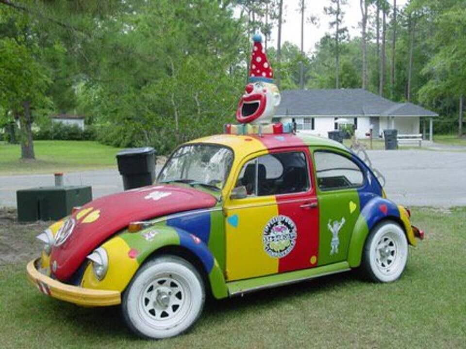 a clown car on a grassy field
